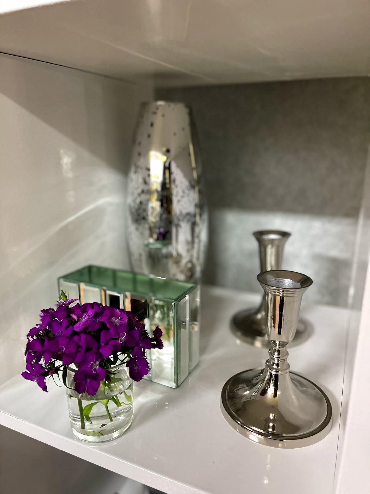 Editorial dianthus arrangement with mercury glass
