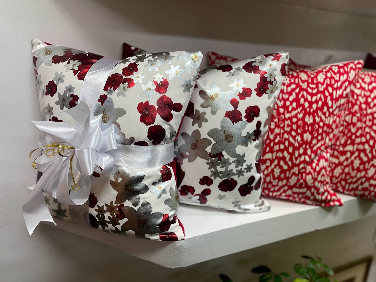Signature Yellow branded throw pillows